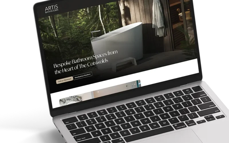 Artis Bathrooms Homepage render on MacBook Pro